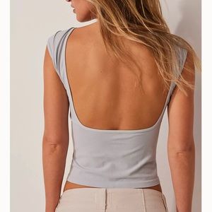 White open back free people tank top